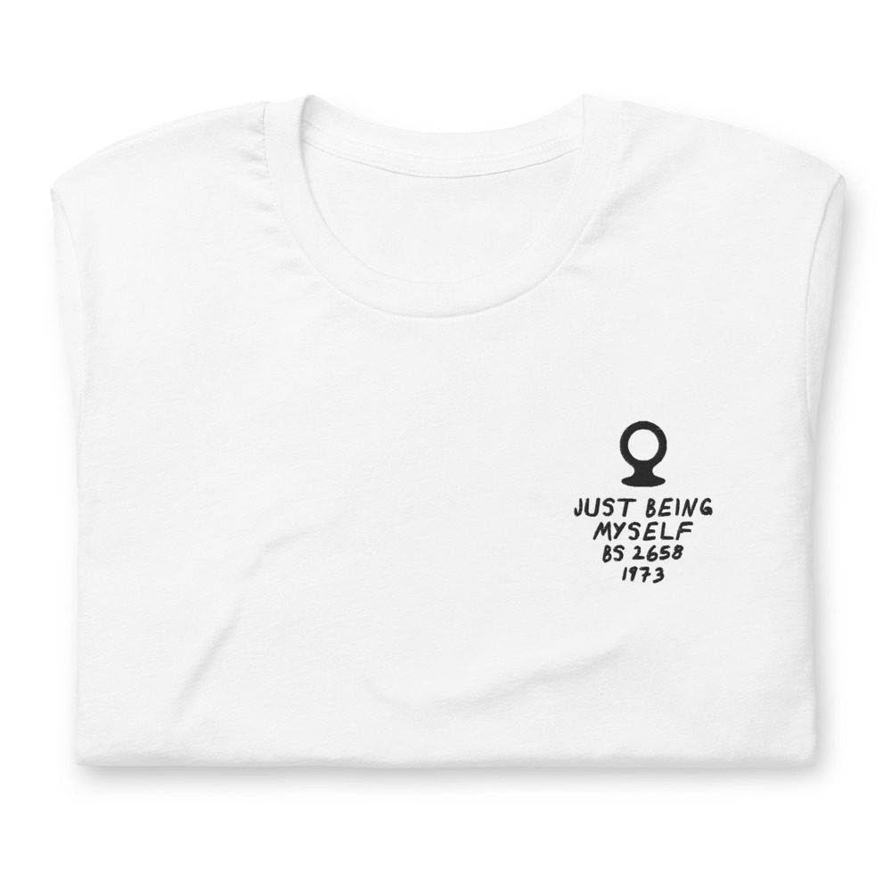 Its shirt, folded: a white tee with the record embroidered on the chest