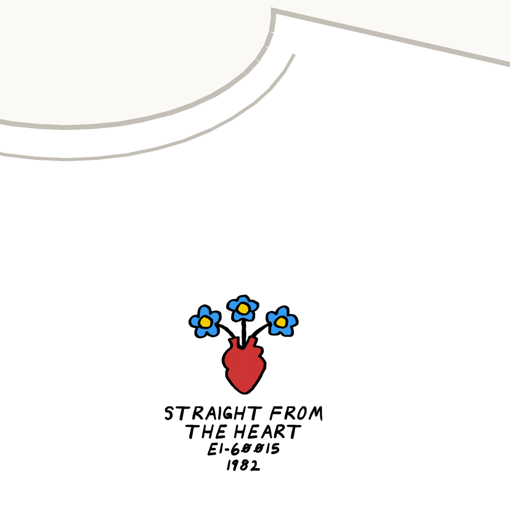 A white tee, embroidered in red, sky blue, gold and black thread. My drawing of a heart with forget-me-nots growing out of it, because “Forget Me Nots” is the record’s big one.
